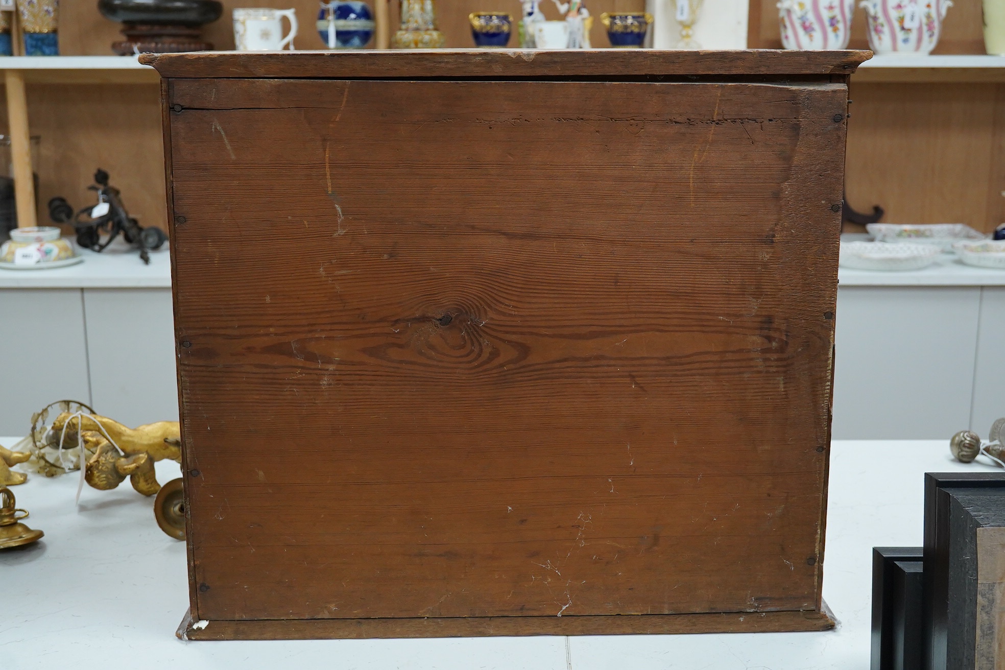 A small mahogany specimen Wellington chest with five drawers, 48cm high. Condition - fair